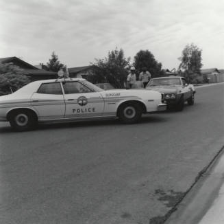 Sergeant Police with Unidentified Car