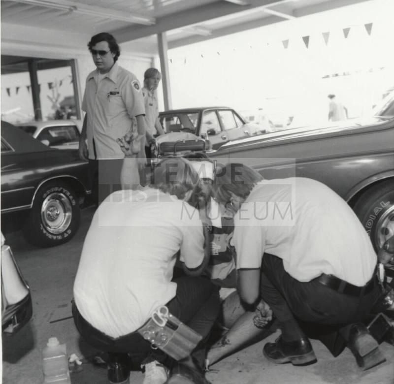 Paramedics tend to injury victim - Tempe Daily News, September 1977.