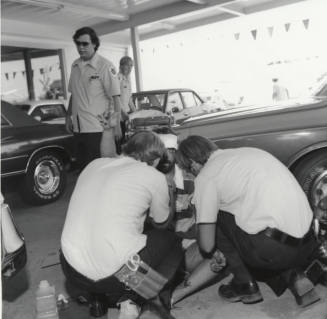 Paramedics tend to injury victim - Tempe Daily News, September 1977.