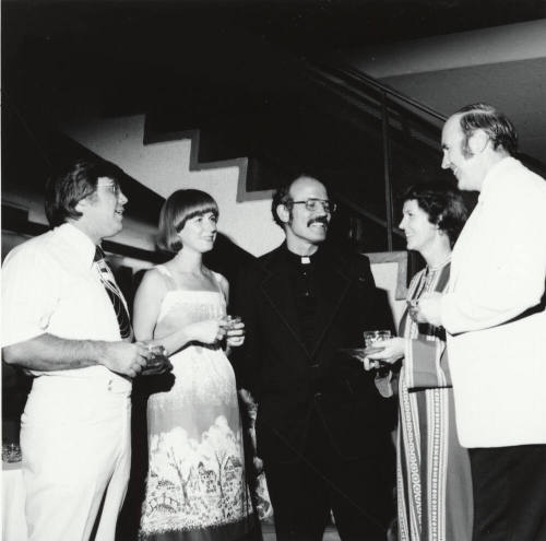 Friends talking.  September 1977