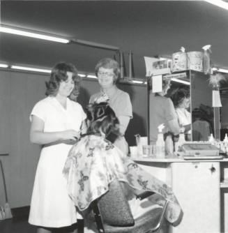 Getting a hair cut. - September 1977