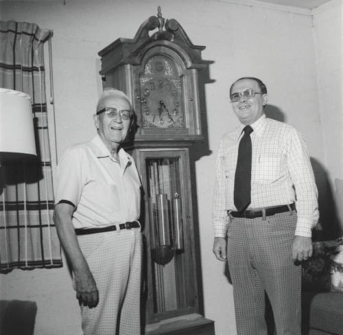 Two Unidentified Men & Grandfather Clock