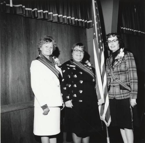 Three Unidentified Women Wearing Sashes