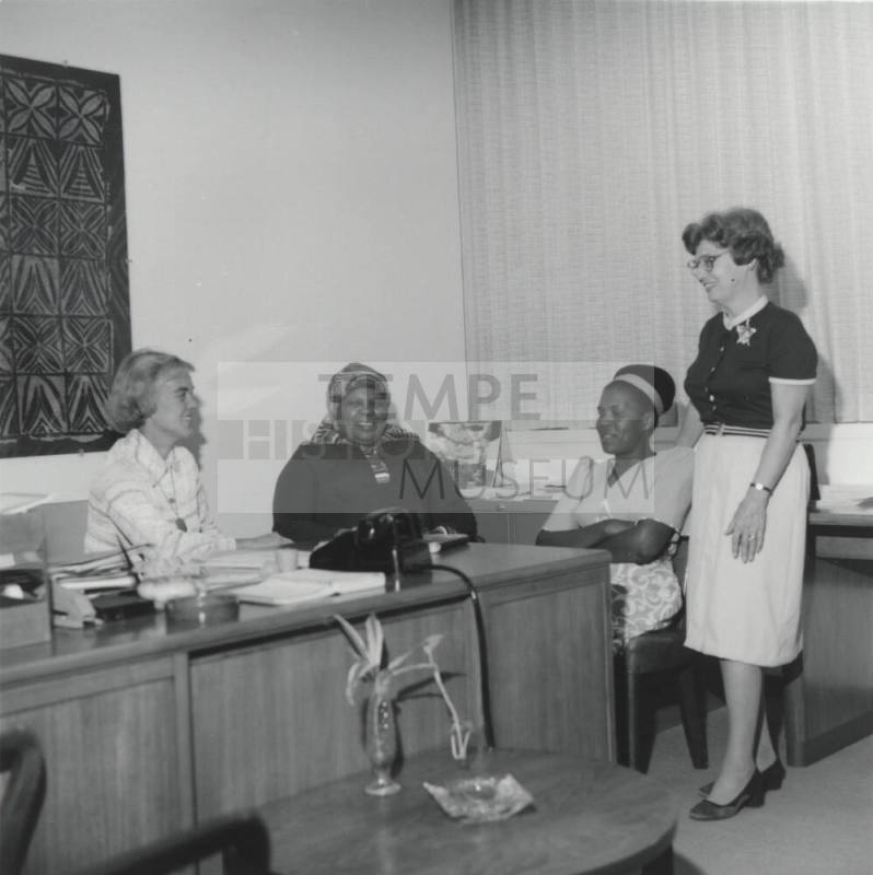 Women sitting. - October 1977
