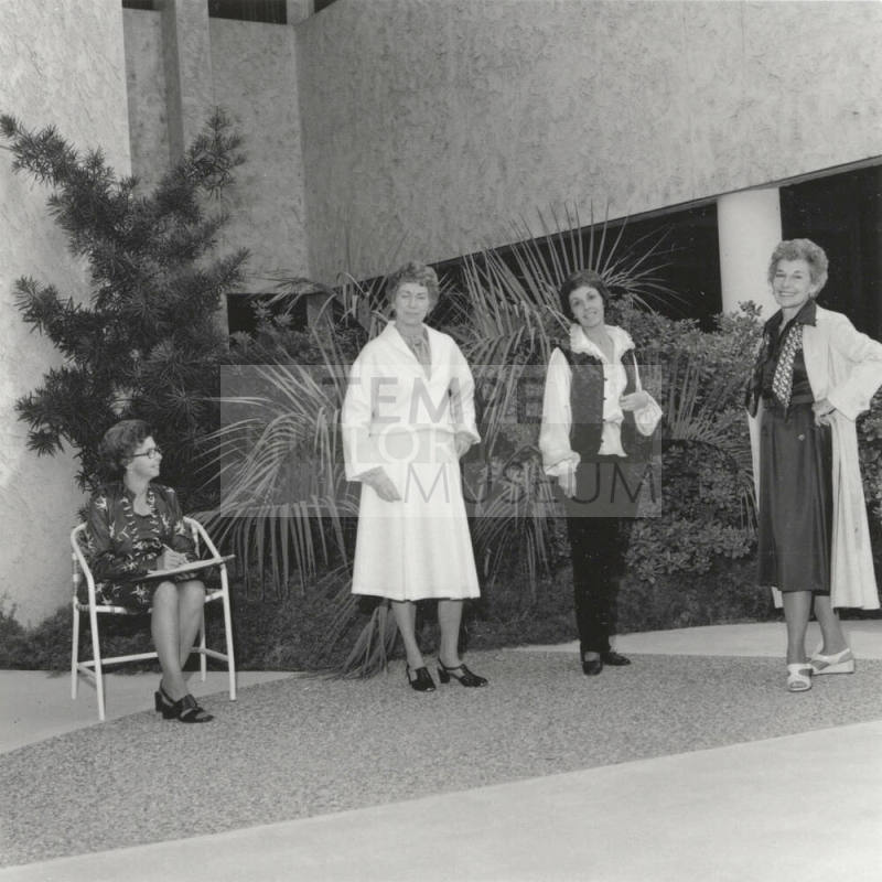Women posing. - October 1977