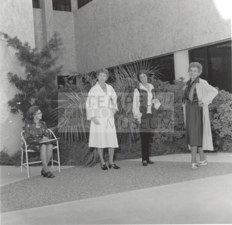 Women posing. - October 1977
