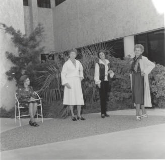 Women posing. - October 1977