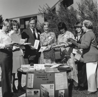 Looking With Care - Tempe Daily News,             November 7, 1977