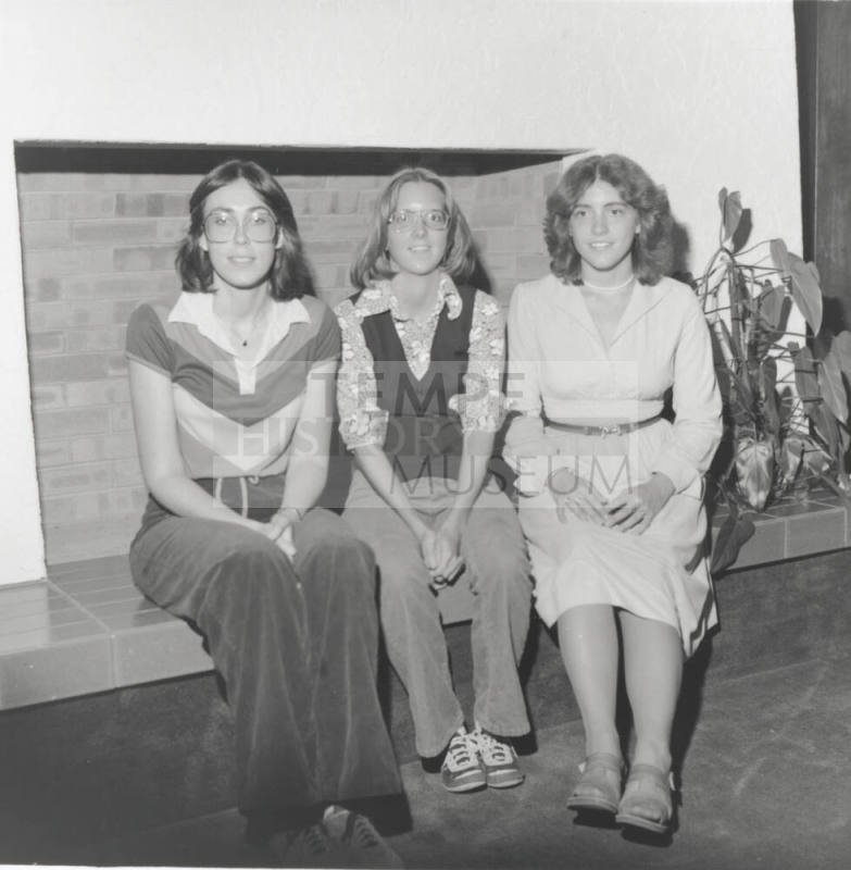 Three young women sitting