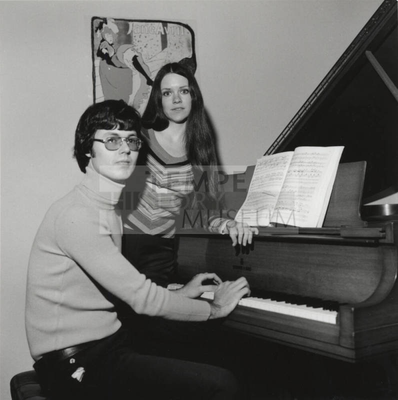 Man And Woman At A Piano