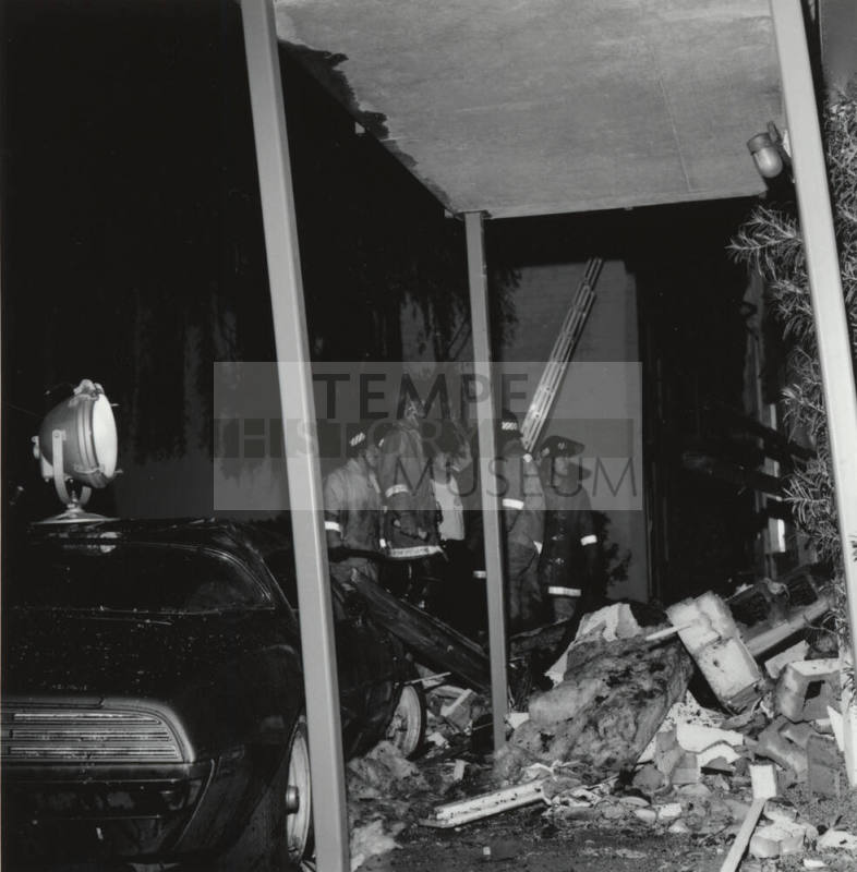 Surveying Damage (left) - Tempe Daily News 12/10/1977