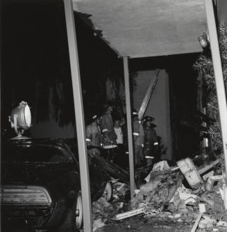 Surveying Damage (left) - Tempe Daily News 12/10/1977