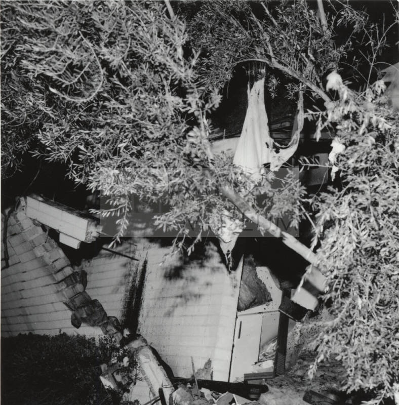 Surveying Damage (right) - Tempe Daily News 12/10/1977