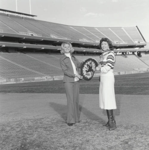 Women Stand In Sun Devil Stadium