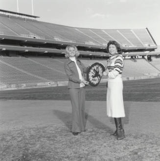 Women Stand In Sun Devil Stadium