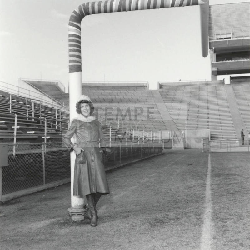 Woman Leans On Goal Post In Sun Devil Stadium