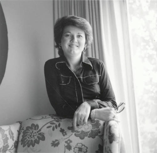 Portrait of a Woman Leaning on Chair