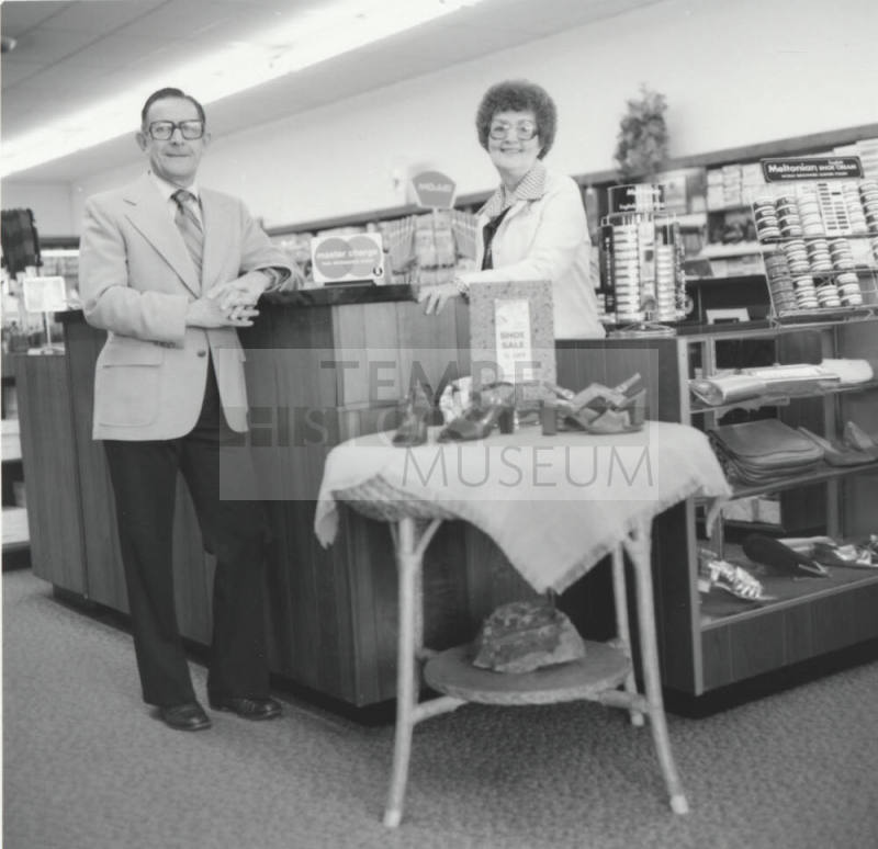 A Man and a Woman in a Shoe Store