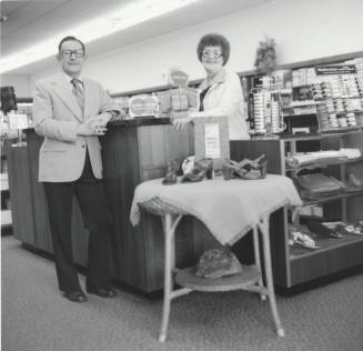 A Man and a Woman in a Shoe Store