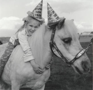 New Year Girl and Pony Close Up