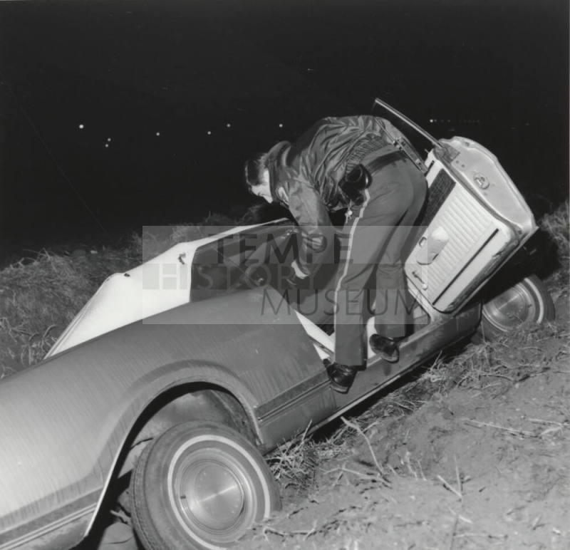 Police Officer and Car on Side