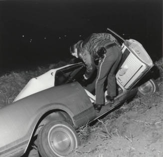 Police Officer and Car on Side