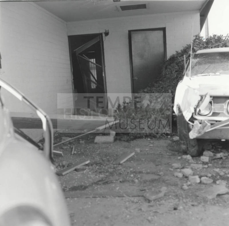 White Car and Destroyed Carport