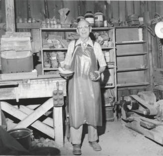 Man in workshop, Jan 1978