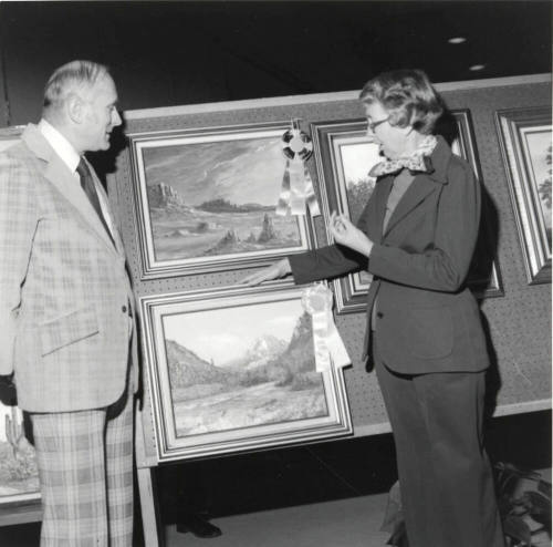 Unidentified Couple Discussing Art
