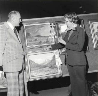 Unidentified Couple Discussing Art
