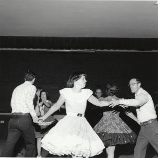 Members of the Tempe Tenderfoot Square Dancing group sqaure dancing (4 of 4)
