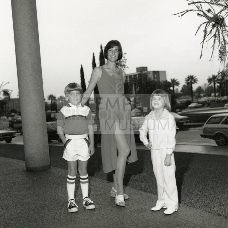 One Woman and Two Children Posing