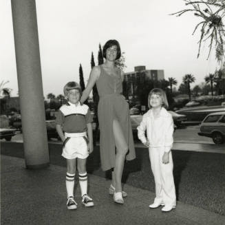 One Woman and Two Children Posing