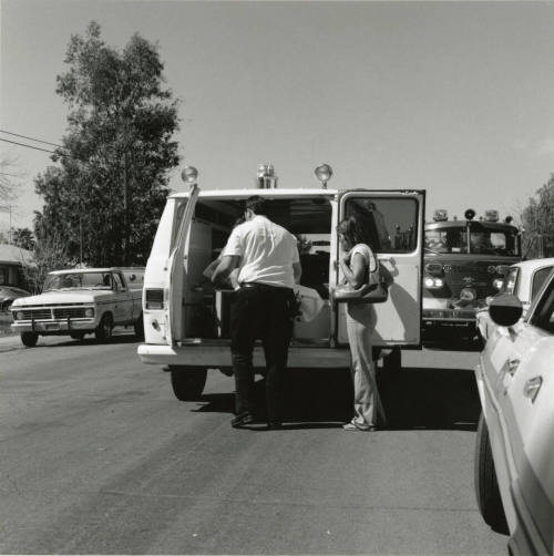 Man Loading  Ambulance