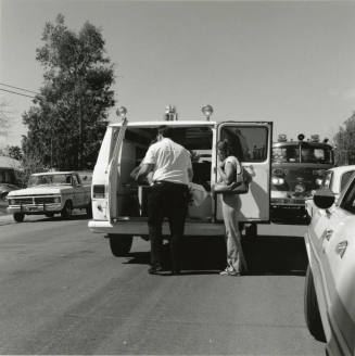 Man Loading  Ambulance
