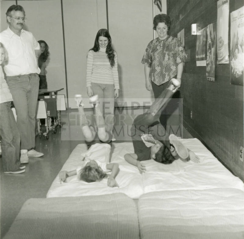 Unidentified People on Tumbling Mats