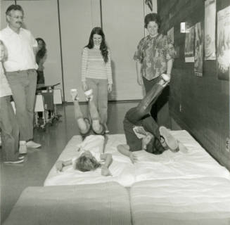 Unidentified People on Tumbling Mats