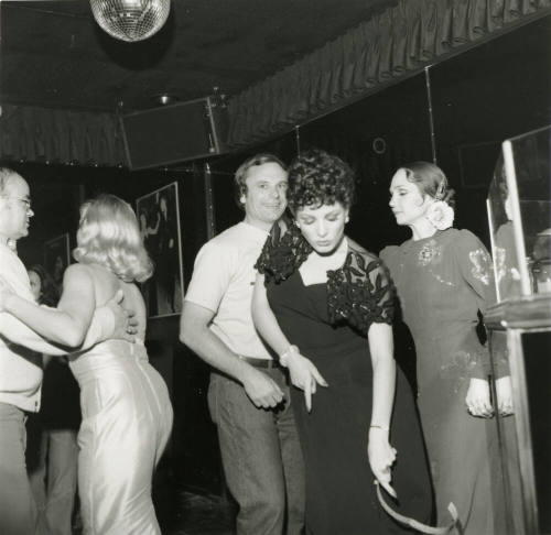 Harry Mitchell dancing Under A Disco Ball
