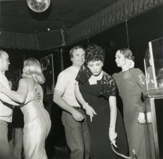 Harry Mitchell dancing Under A Disco Ball