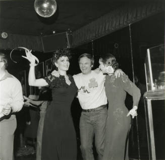 Harry Mitchell posing Under A Disco Ball
