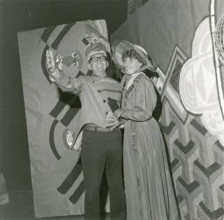 Two Costumed People