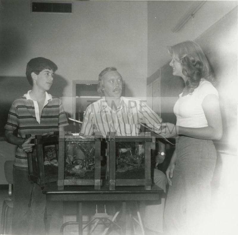 Unidentified Group of Boy, Man and Woman