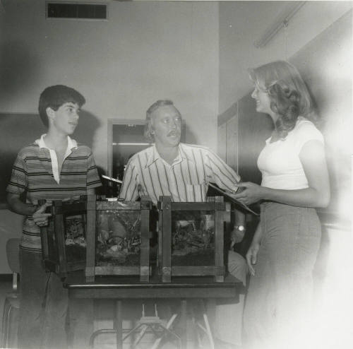 Unidentified Group of Boy, Man and Woman