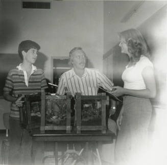 Unidentified Group of Boy, Man and Woman