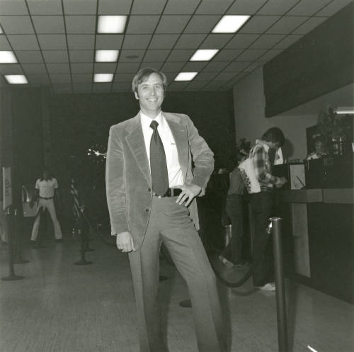 Unidentified Man Standing In Bank or Credit Union (2 of 2)