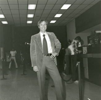Unidentified Man Standing In Bank or Credit Union (2 of 2)