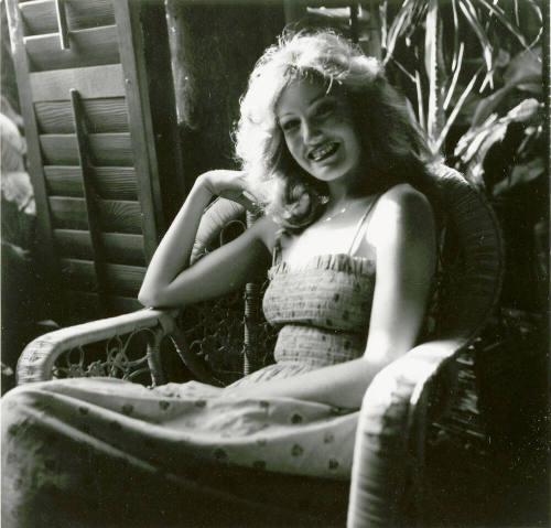 Young woman in chair -- May 1978