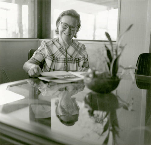 Woman at table -- April 1978