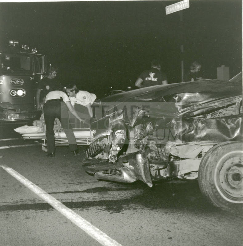 Car Accident, Paramedics Helping a Victim