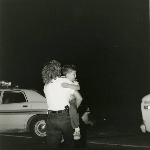 Woman Holding a Child